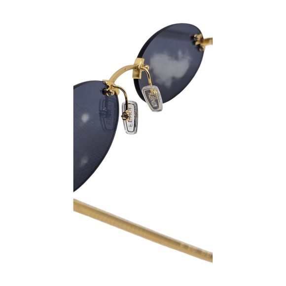 Elegant Gold and Black Sunglasses - Picture 2 of 4